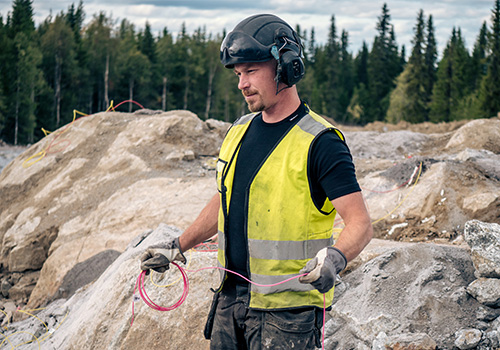 Workman at a construction site in Woolpower workwear