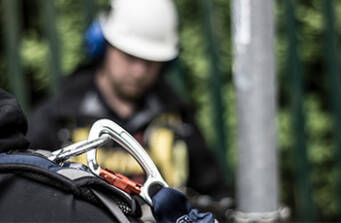 How do you choose the most suitable fall arrest harness for working at height or at depth?